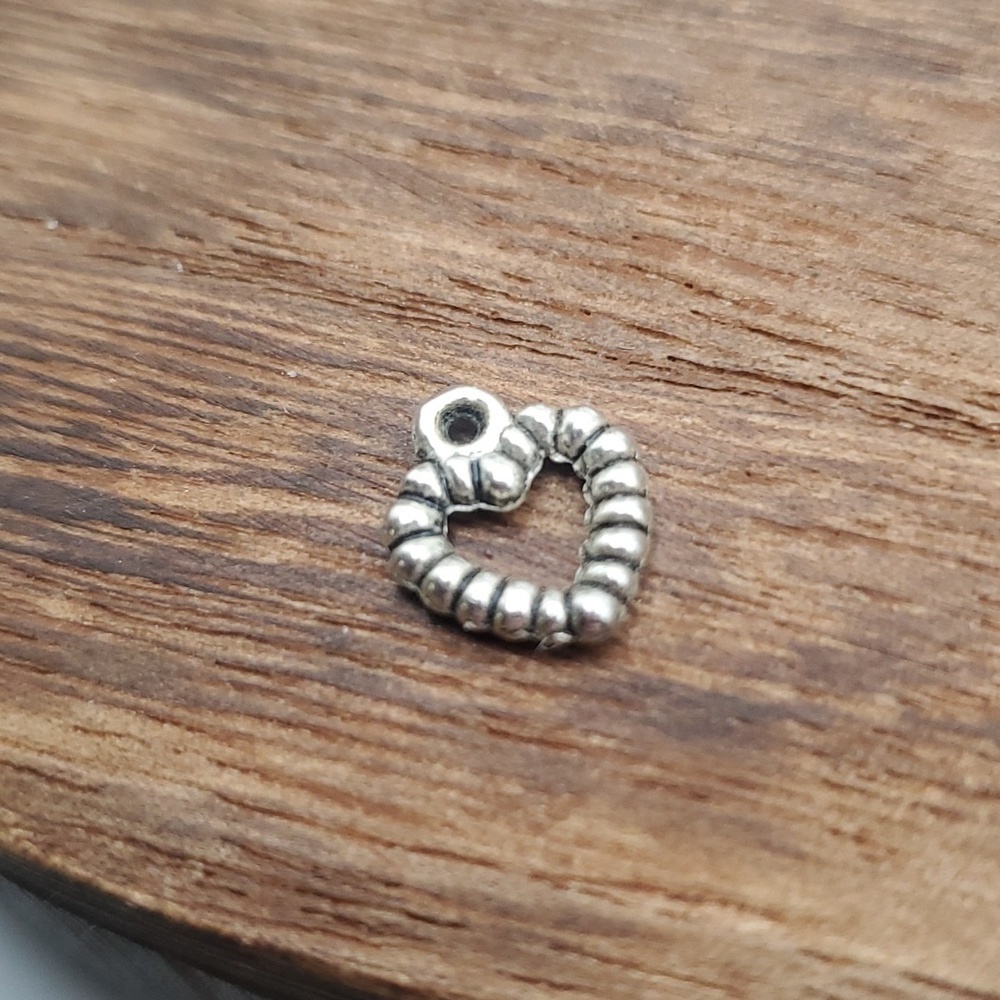 Braided silver‎ heart charm pendant